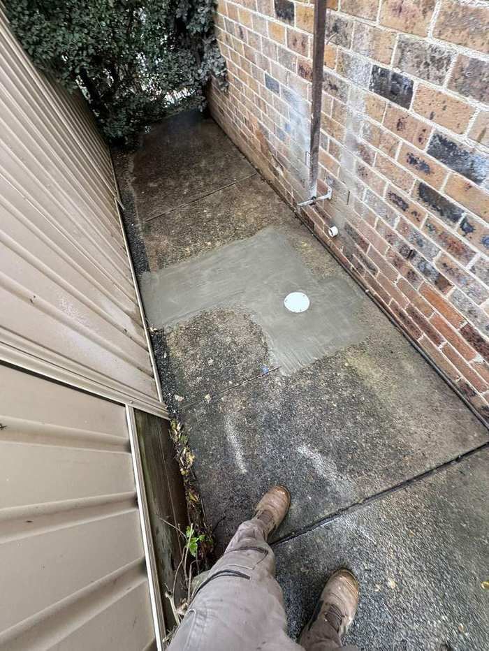 Freshly patched and finished concrete path